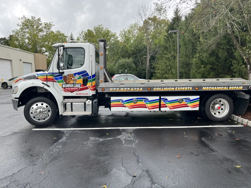 Beaver Lake Auto Repair rollback tow truck with printed and cut vehicle lettering in Franklin NJ