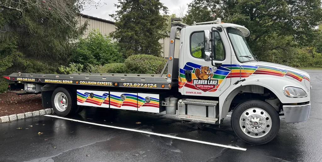 Beaver Lake Auto Repair rollback tow truck with printed and cut vehicle lettering in Franklin NJ
