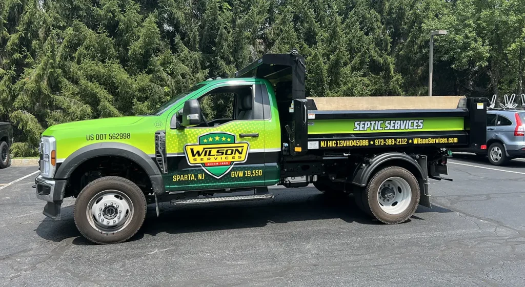 Wilson Services Ford F-550 dump truck with fleet graphics in Sparta NJ