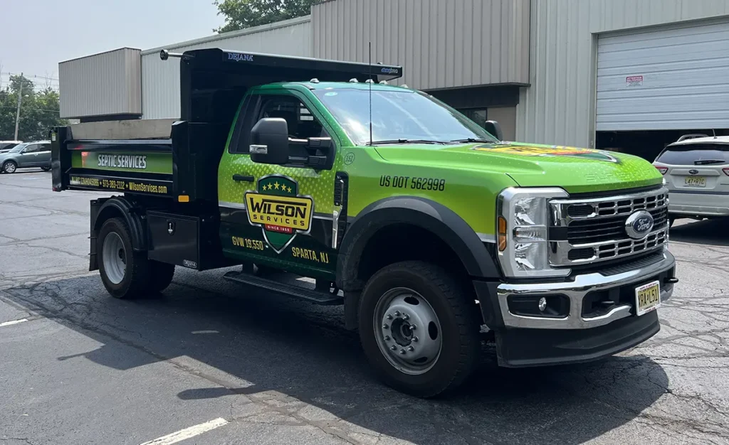 Wilson Services Ford F-550 dump truck with fleet graphics in Sparta NJ