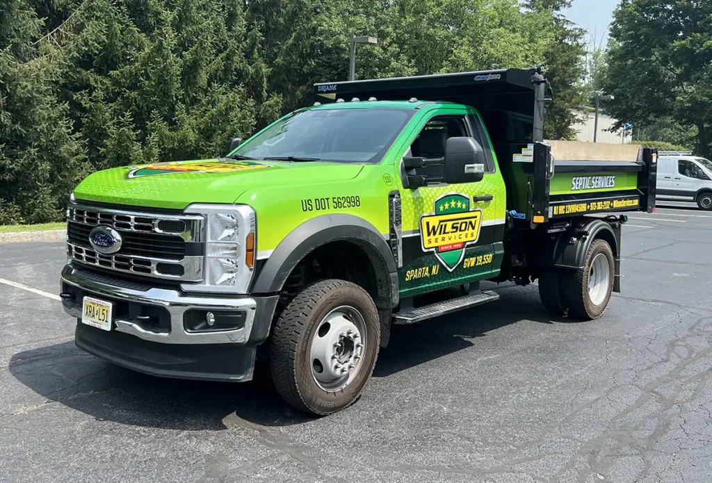 Wilson Services Ford F-550 dump truck with fleet graphics in Sparta NJ