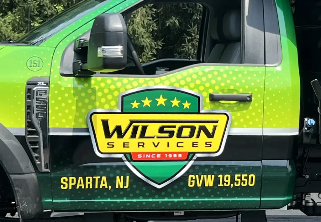 Wilson Services Ford F-550 dump truck with fleet graphics in Sparta NJ