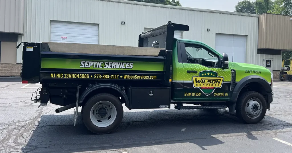 Wilson Services Ford F-550 dump truck with fleet graphics in Sparta NJ